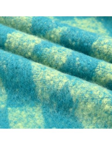 Ruana diseño geometrico con flecos - SKORA