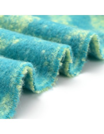 Ruana diseño geometrico con flecos - SKORA